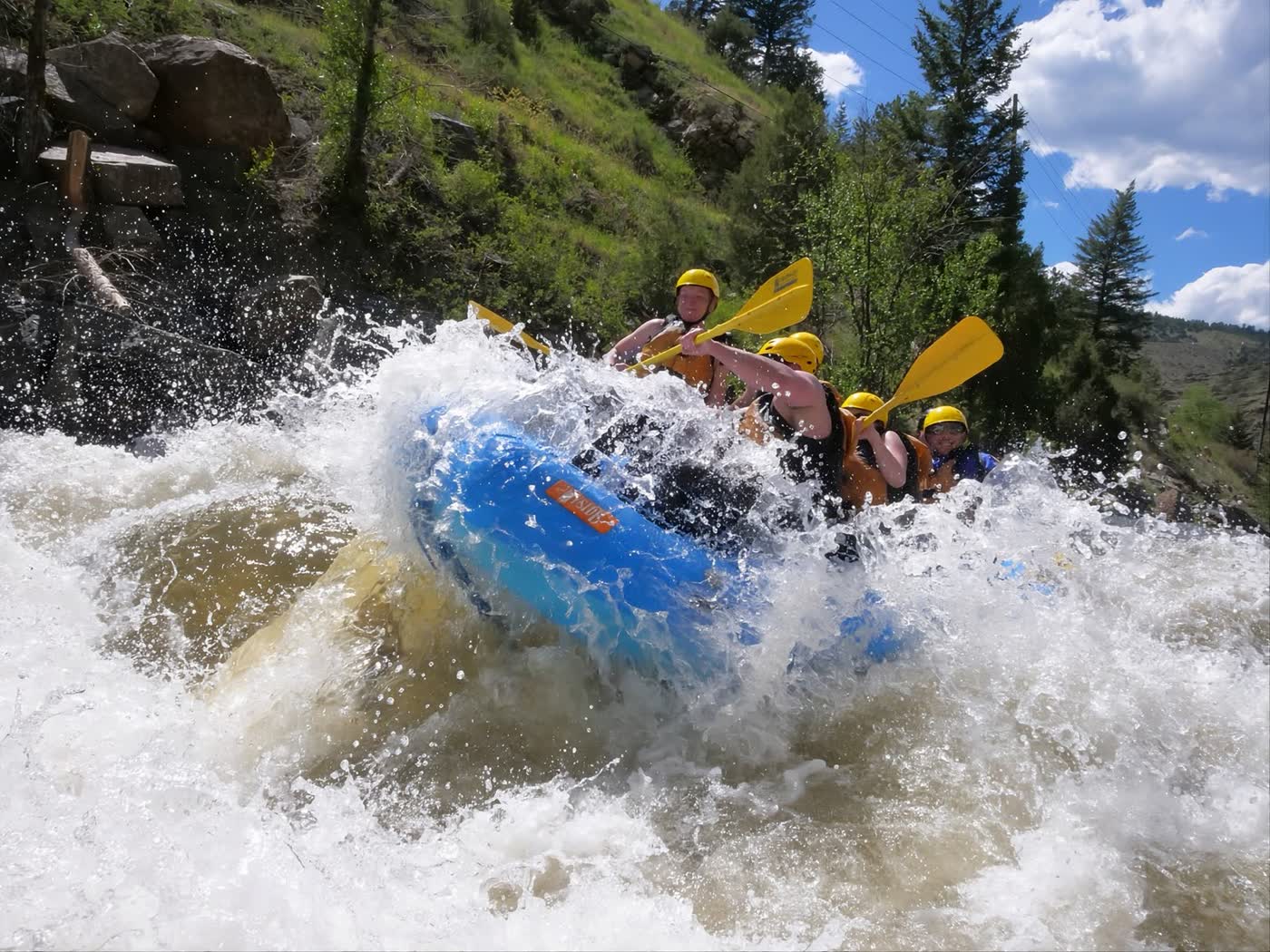 Advanced whitewater rafting action