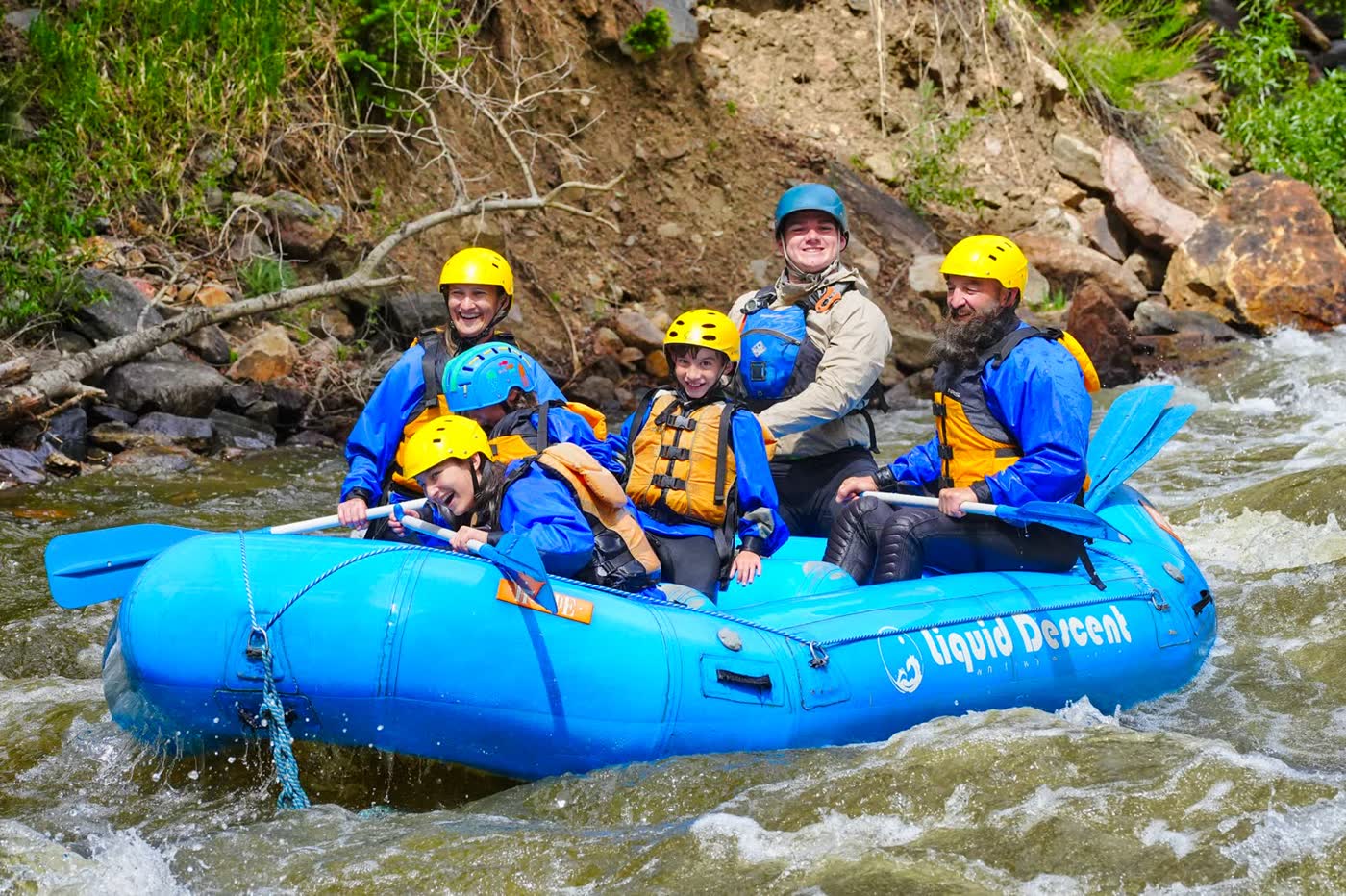 Group celebrating a Clear Creek rafting trip