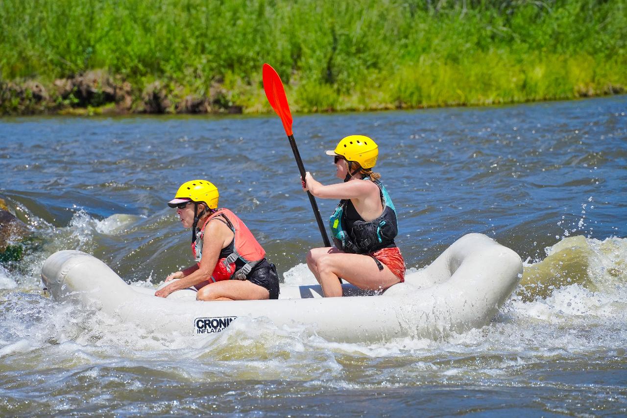 Guided inflatable kayak tour on the Upper Colorado River near Kremmling